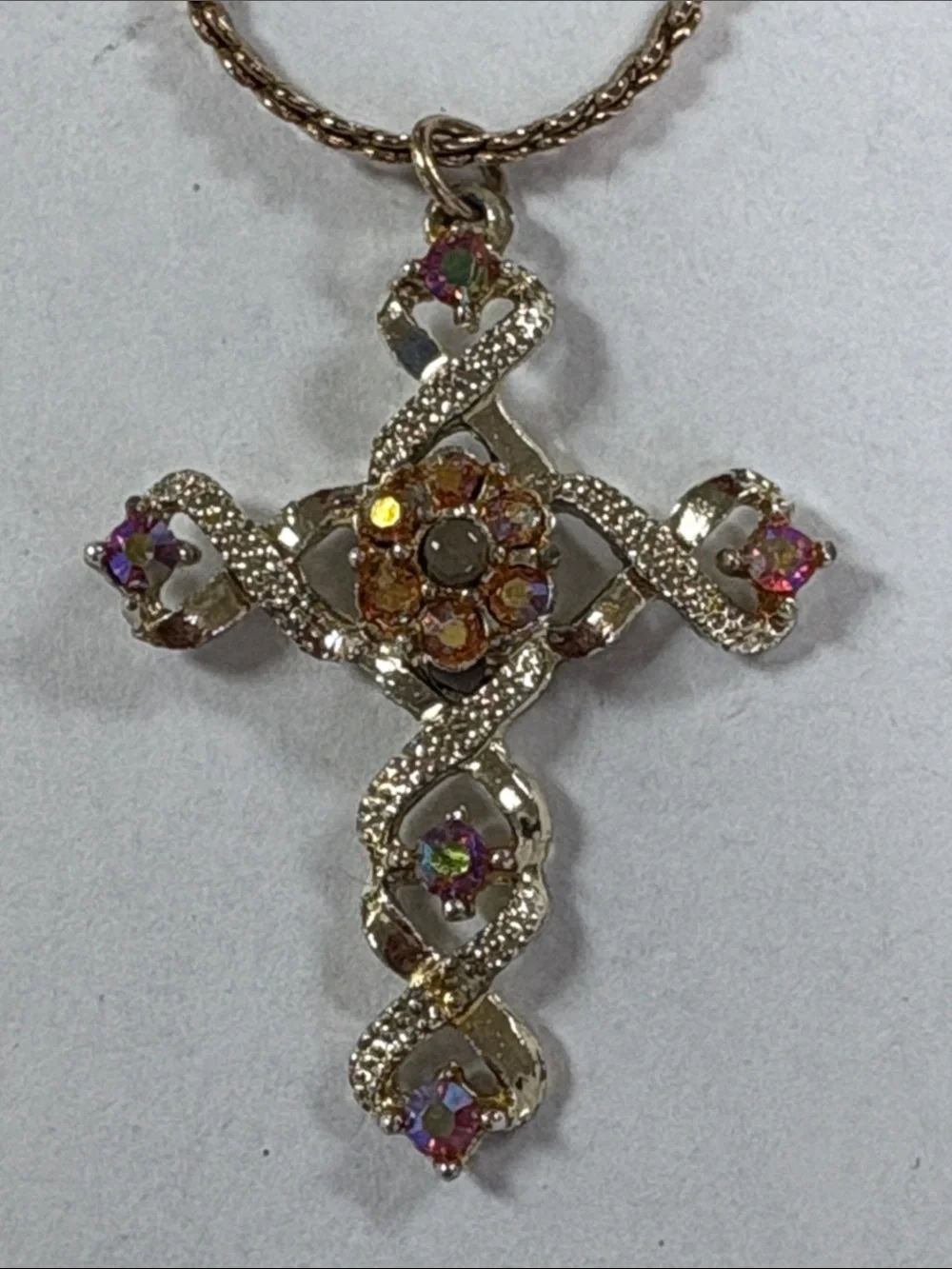 Gold-Tone Cross Pendant Necklace with Pink and Amber Accents